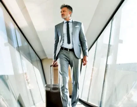 A businessman disembarking from the airplane.