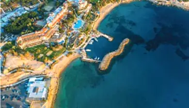 An aerial photo of Leptos Calypso Hotel, highlighting its prime beachfront location.