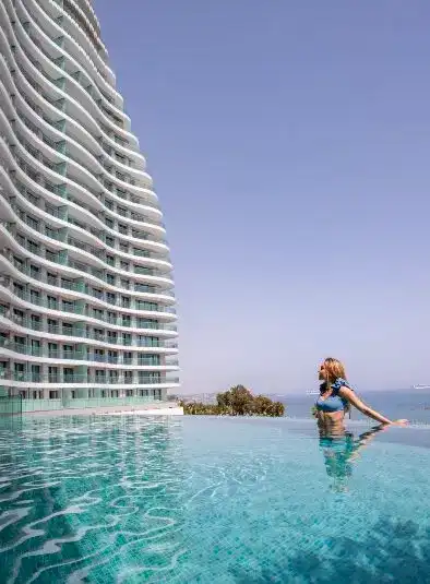 A beautiful photo of the elevated swimming pool at Limassol Del Mar.