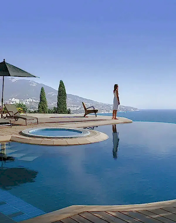 An impressive hillside villa in Cyprus, showcasing the allure of real estate in Cyprus with its captivating views.